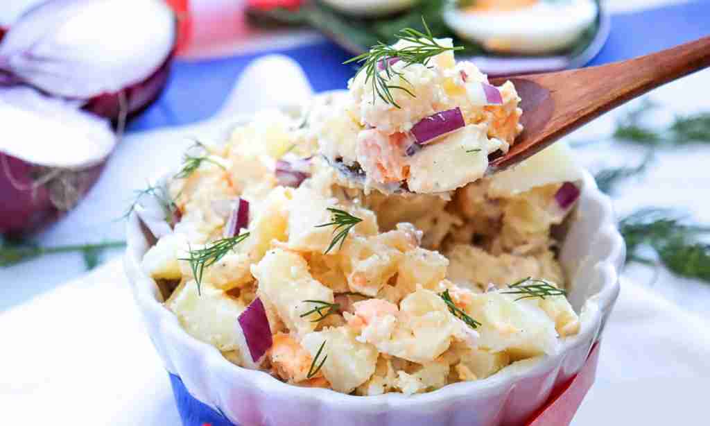 Easy Potato Salad Recipe for Busy Moms Easy Potato Salad Recipe for Busy Moms. a bowl of potato salad with a wooden spoon