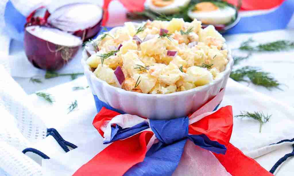 Easy Potato Salad Recipe for Busy Moms Easy Potato Salad Recipe for Busy Moms, a bowl of potato salad with red white and blue ribbon