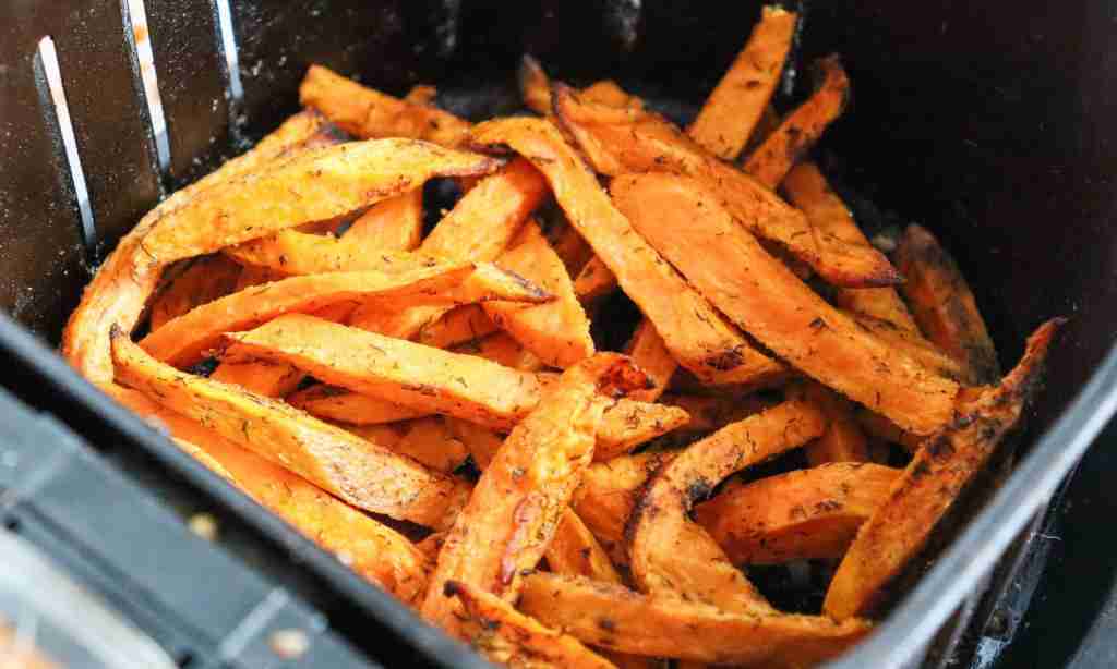 Cook the sweet potatoes a close up of food