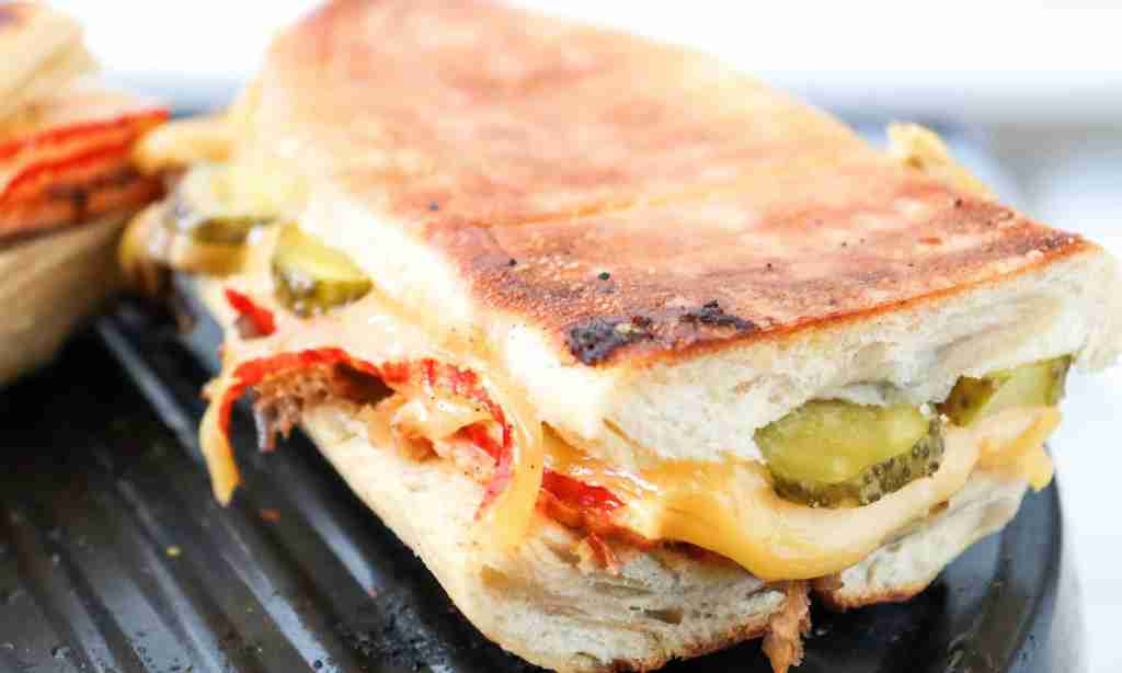 cuban sandwich a sandwich with cheese and pickles