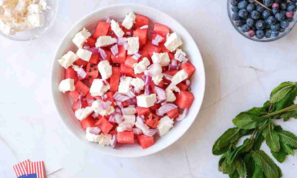Mix the ingredients a bowl of watermelon and feta cheese