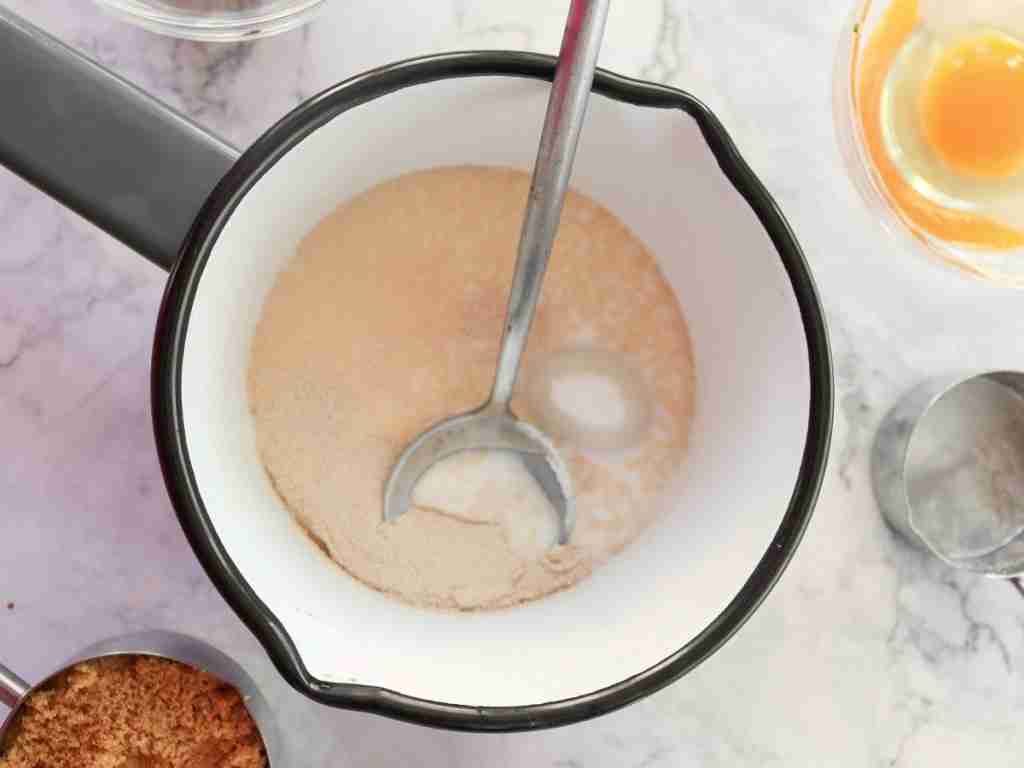 saucepan a bowl of flour with a ladle