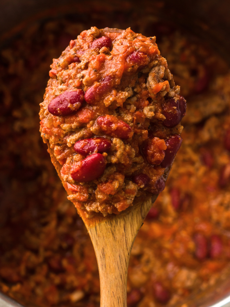 Chili on a spoon Spoonful of hearty chili mixture