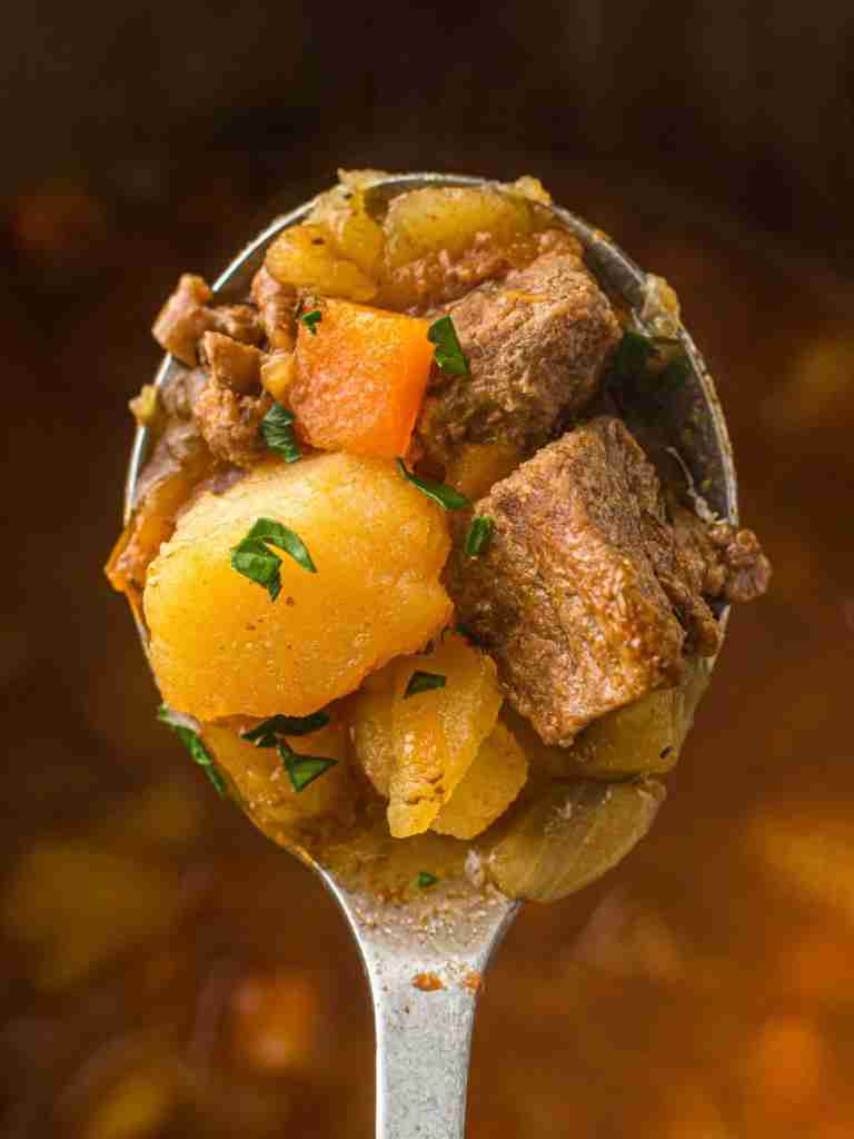 beef stew in a spoon Hearty beef stew on a spoon