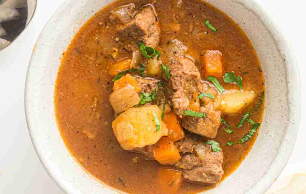 bowl of beef stew Hearty beef stew with vegetables
