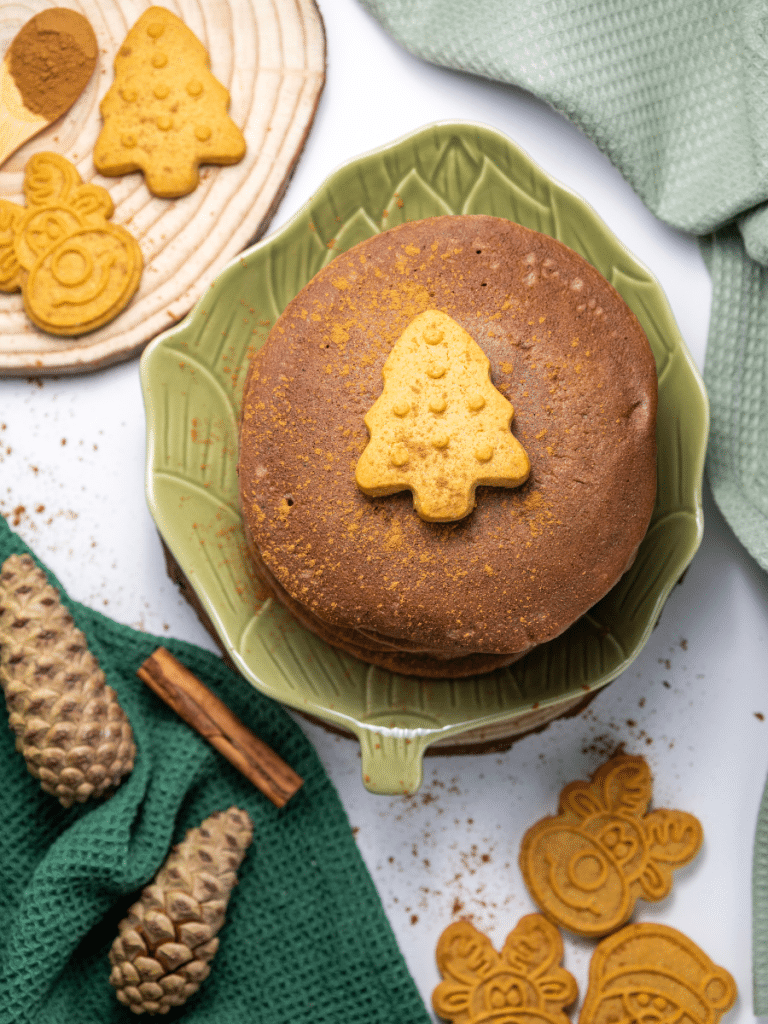 delicious gingerbread pancakes Christmas-themed baked goods on table
