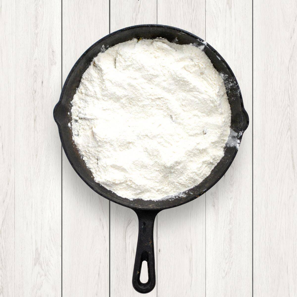 white cake mis in a black skillet