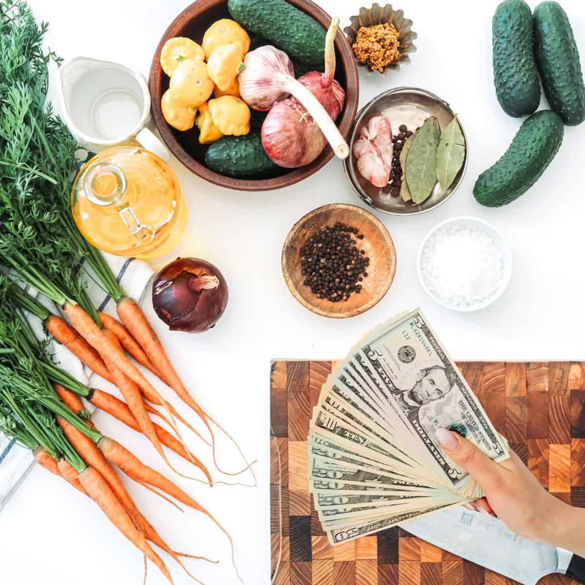 Fresh vegetables, herbs, and money for quick, healthy meal prep for busy moms.